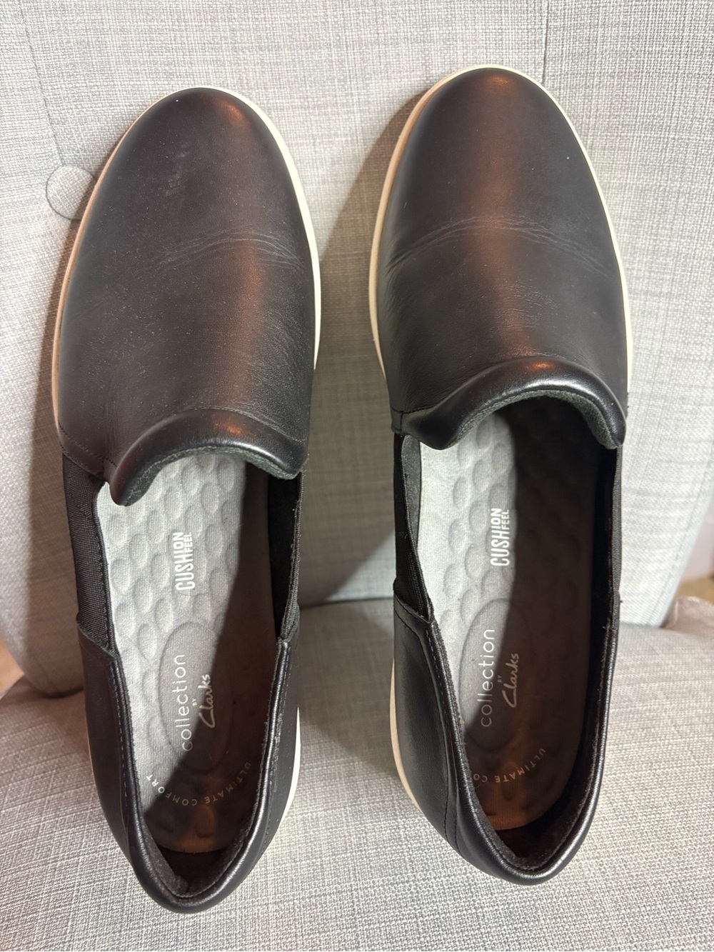 Clarks Women’s Black Slip-On Loafers with White Sole